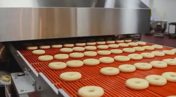 comprar Alta cadena de producción del buñuelo de la automatización con la solución que cubre de la pasta industrial Fabricación en línea