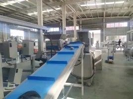 comprar Línea de producción de pastelería totalmente automática con dimensiones de 6560*1575*1620mm, capacidad de 1500 kg y control con pantalla táctil PLC online manufacture